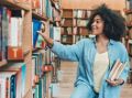 girl picking books